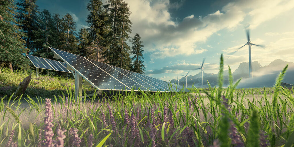 mockup of a green landscape with solar panels and wind turbines