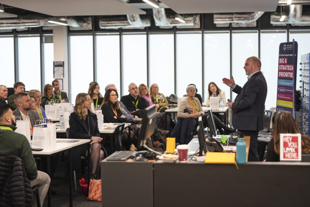 James the CEO giving talk to staff